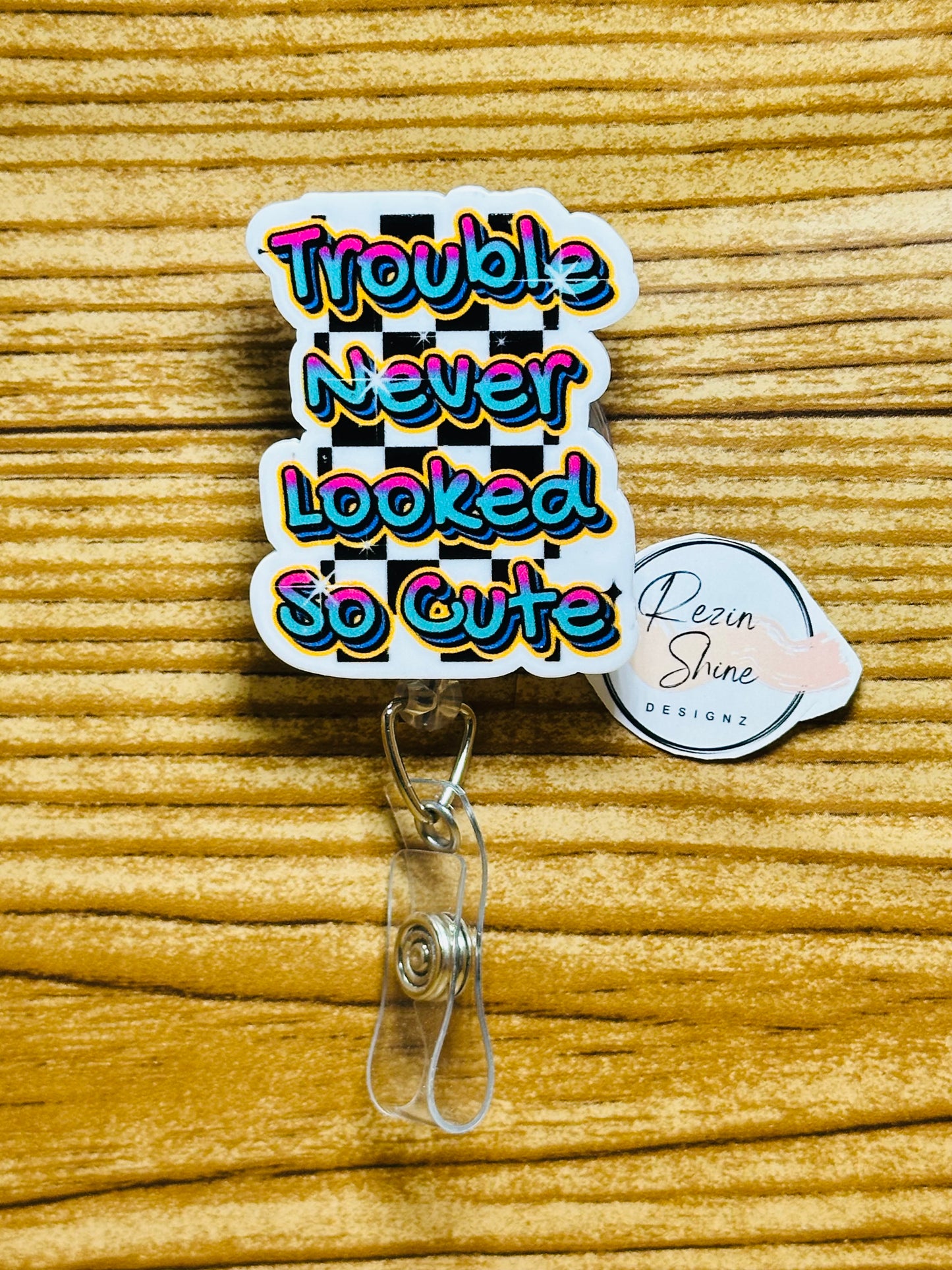 Trouble Never Looked So Cute Badge Reel