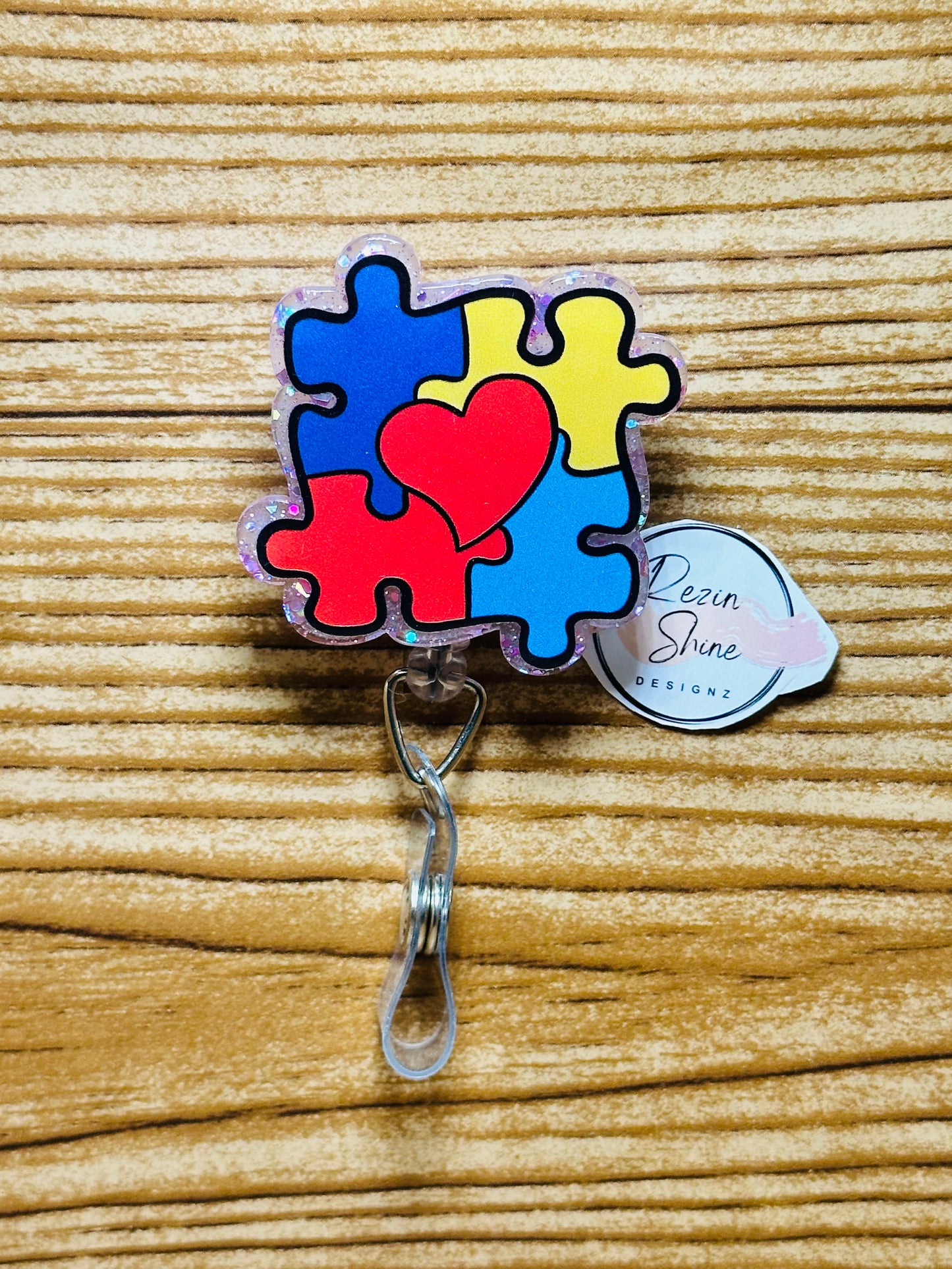 Autism Heart Puzzle Piece Badge Reel