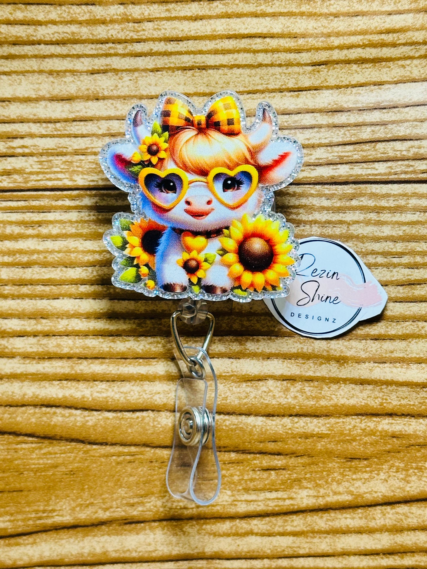 Yellow Flower Cow Badge Reel