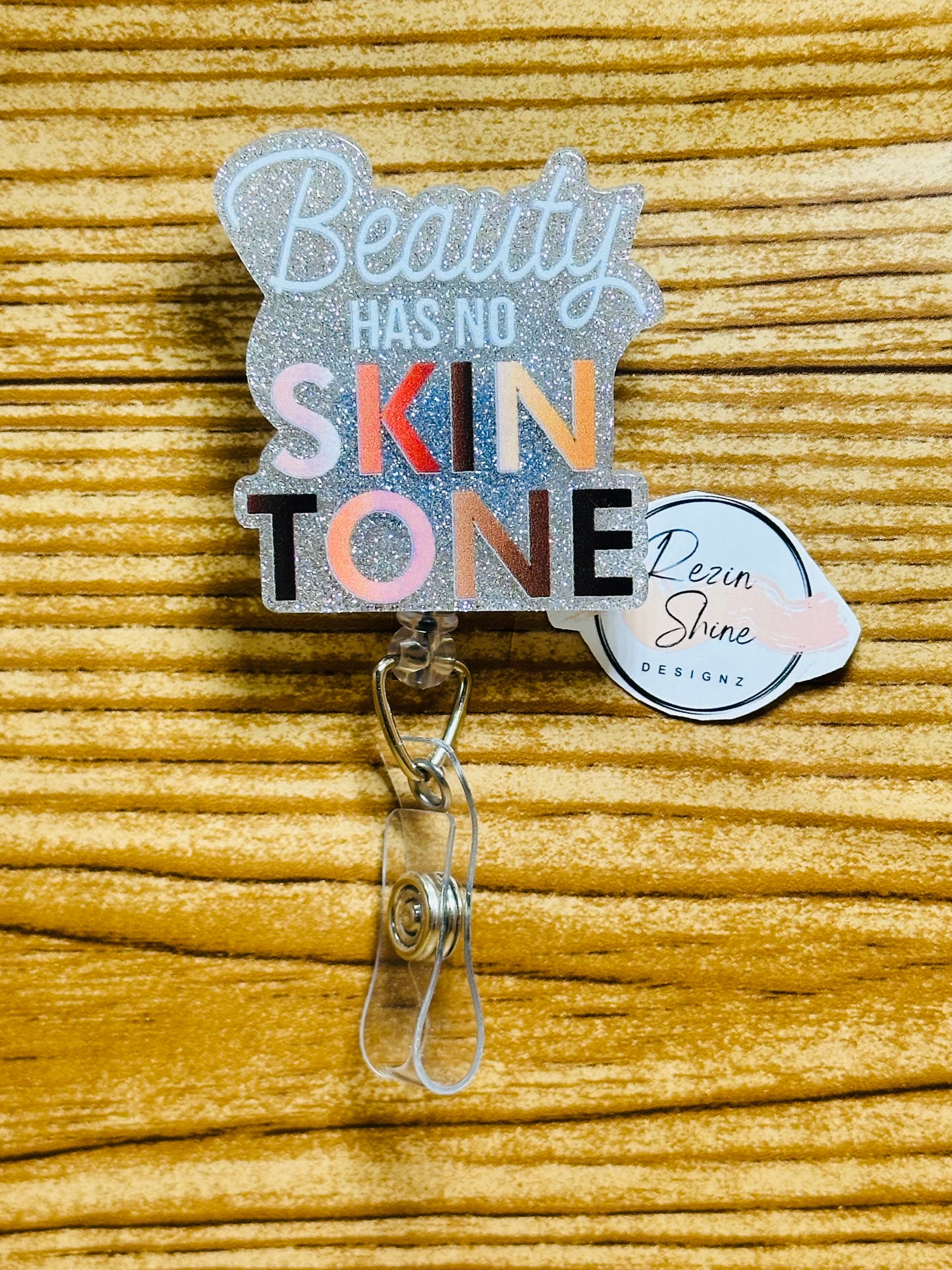 Beauty Has No Skin Tone Badge Reel