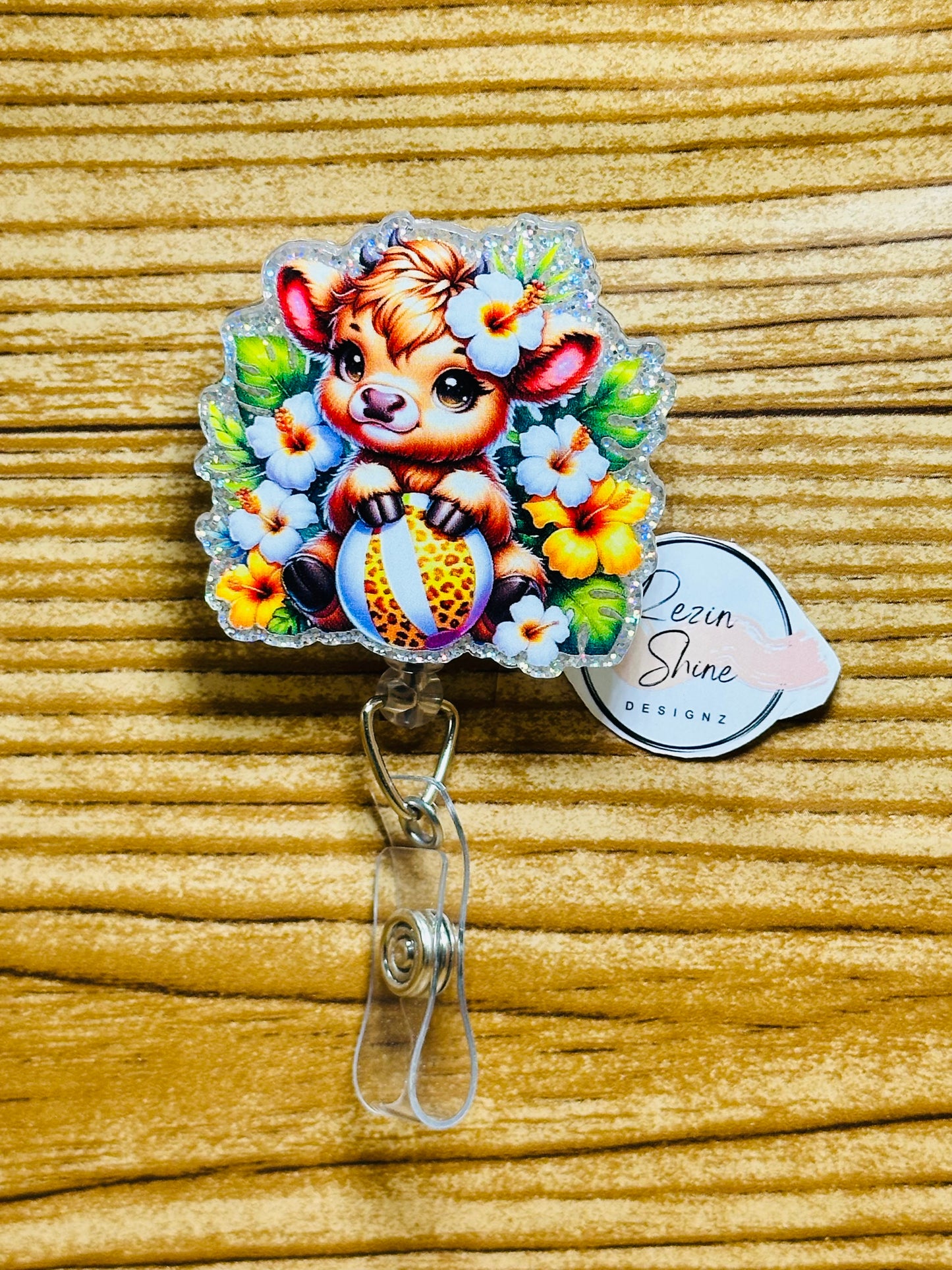 Cow With Ball Badge Reel