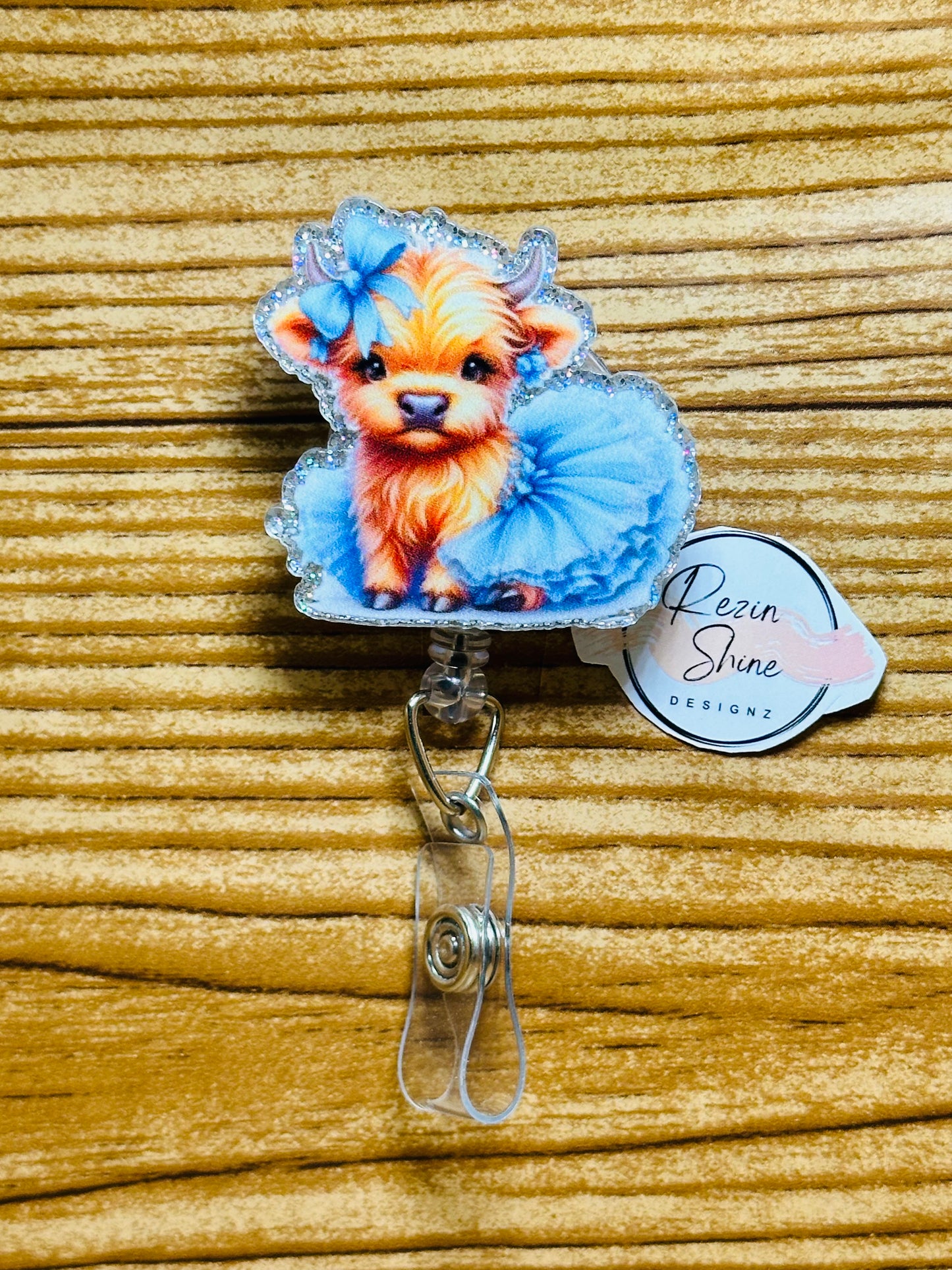 Cow In Blue Dress Badge Reel