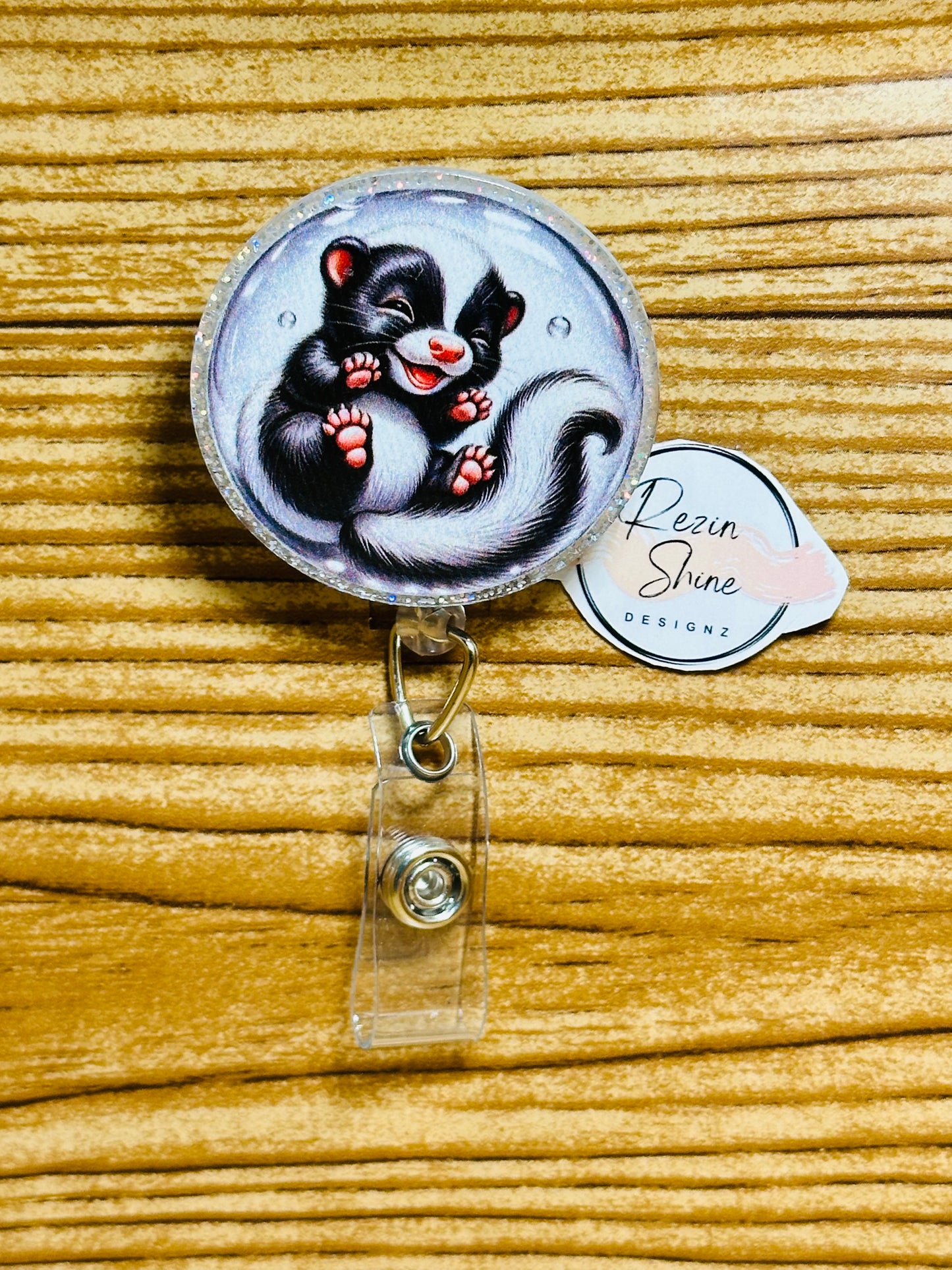 Skunk Badge Reel